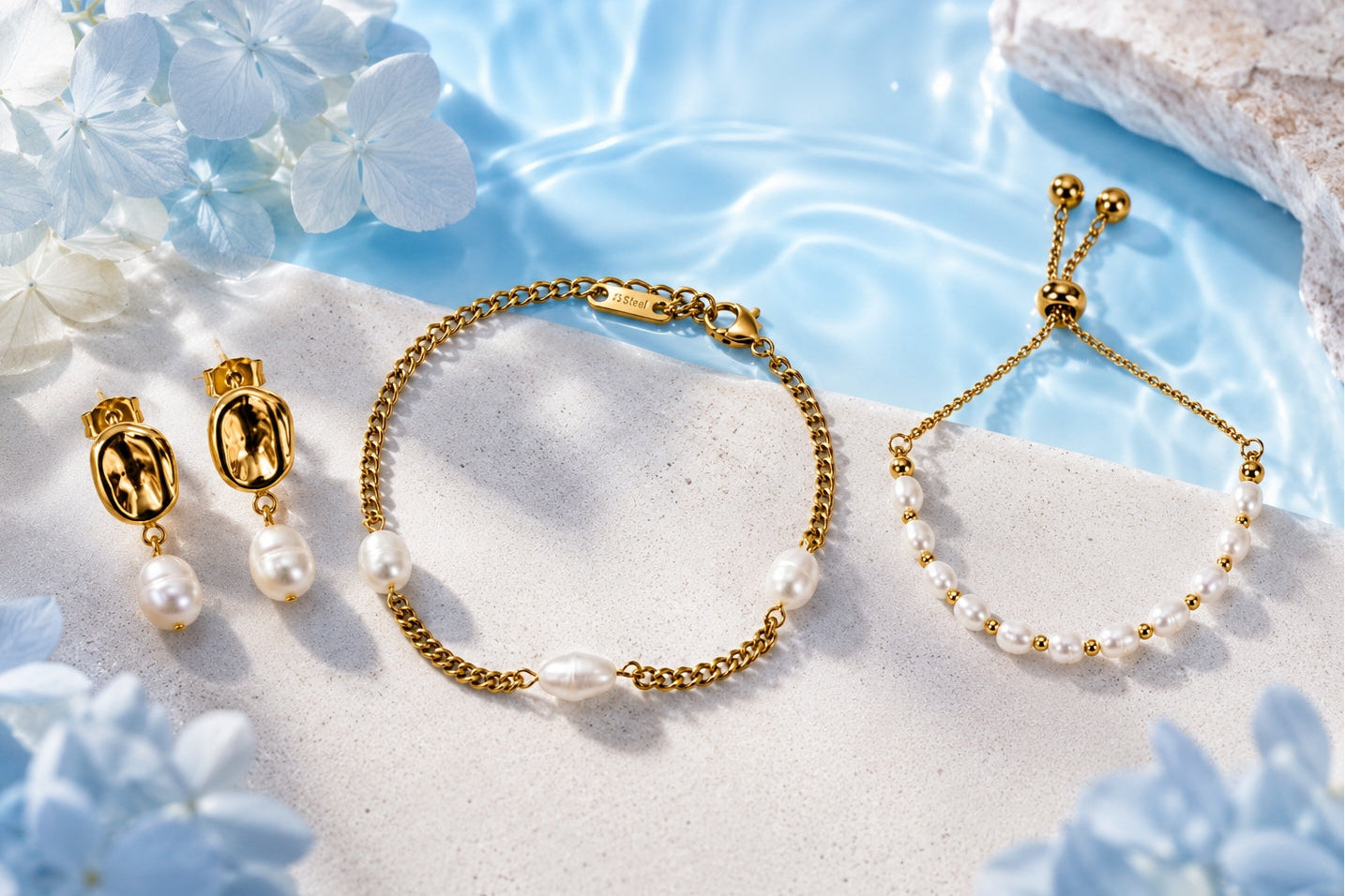 Gold bracelet and earrings with pearls on a light blue floral background